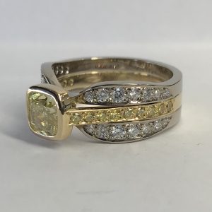 Intense Fancy Yellow Cushion Cut Diamond Ring shoulder view